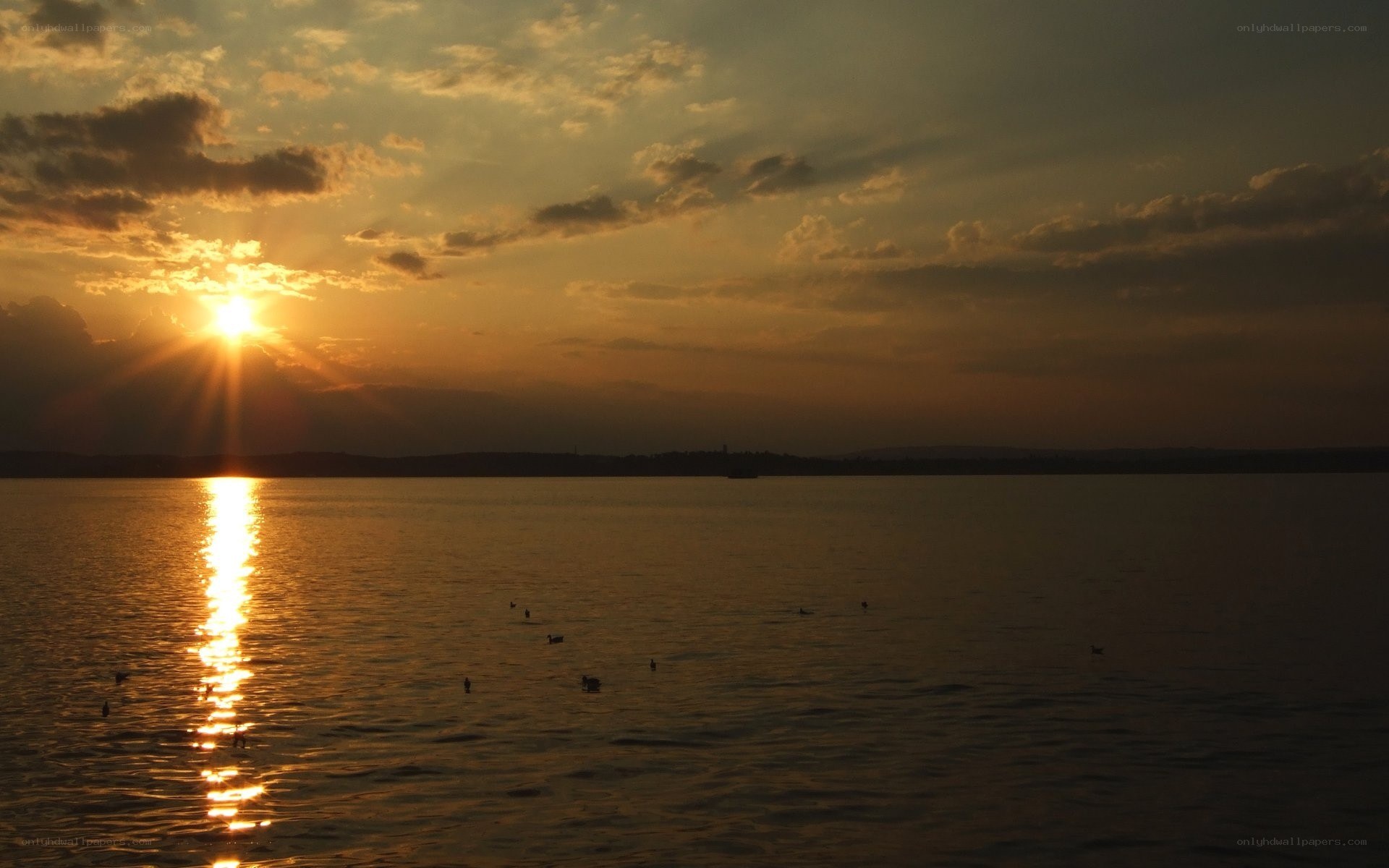 Sunset over a calm lake