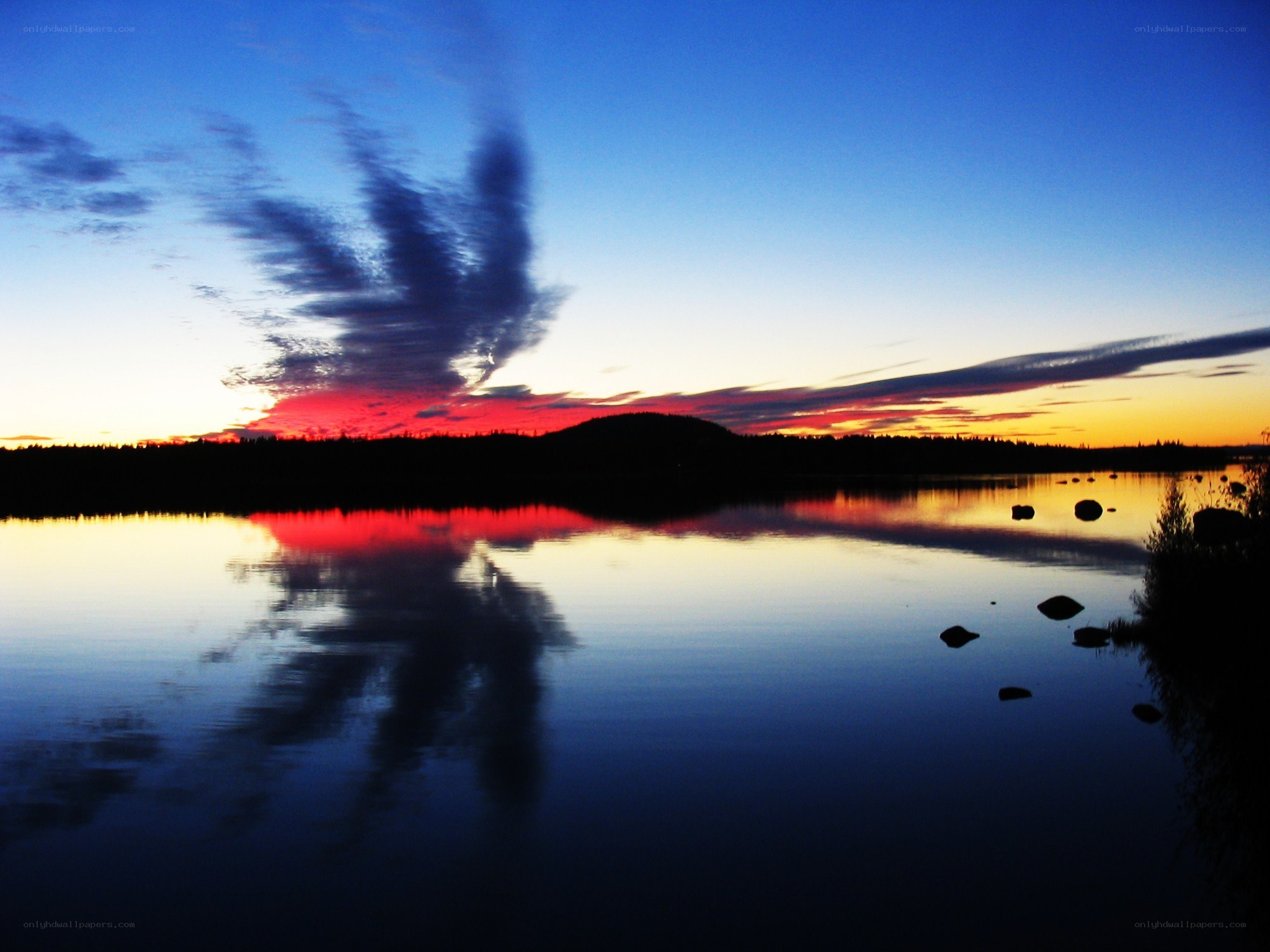 sunset over a calm lake
