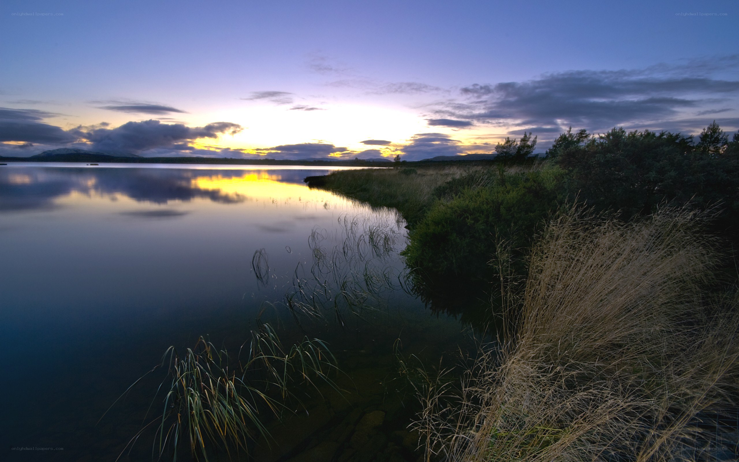 Sunset over a calm lake