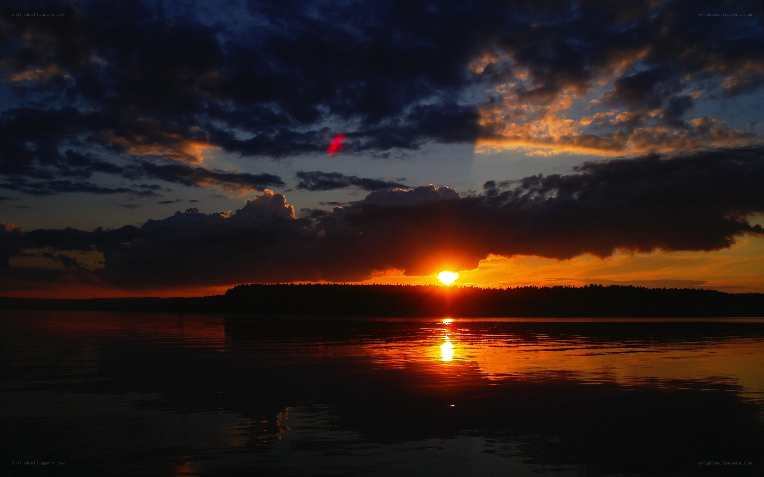 Sunset over a calm lake