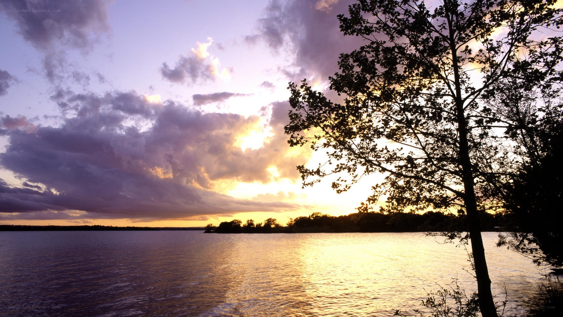 sunset over a calm lake