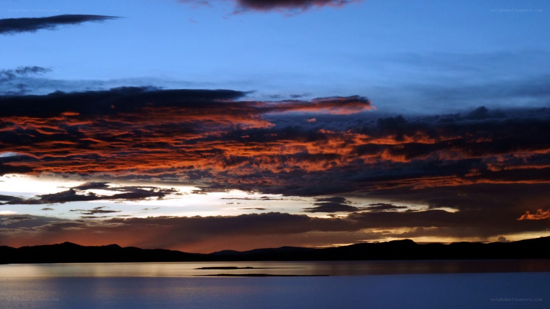 sunset over a calm lake
