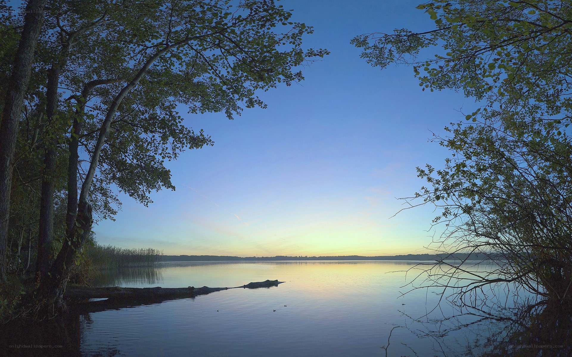 Sunset over a calm lake