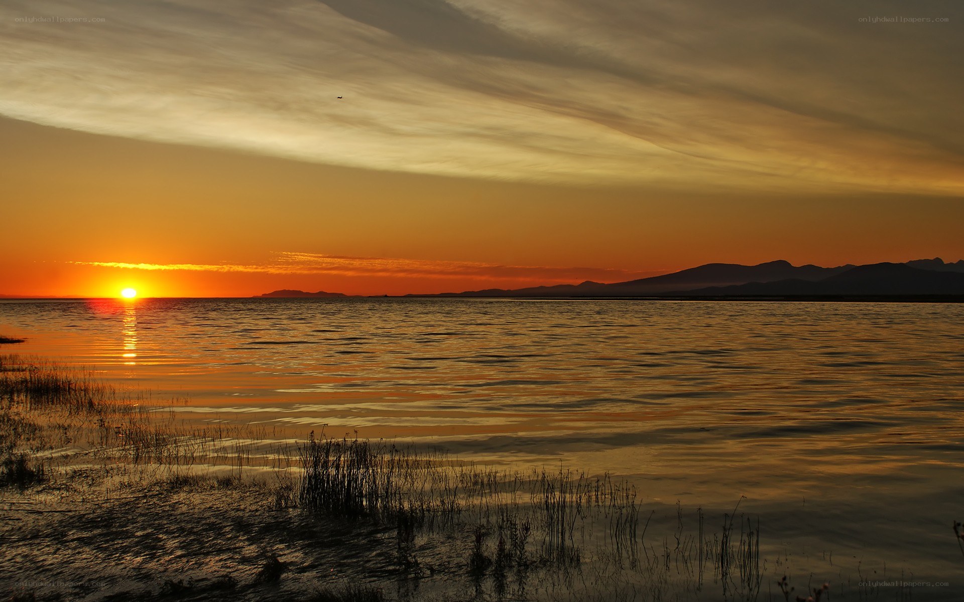 Sunset over a calm lake