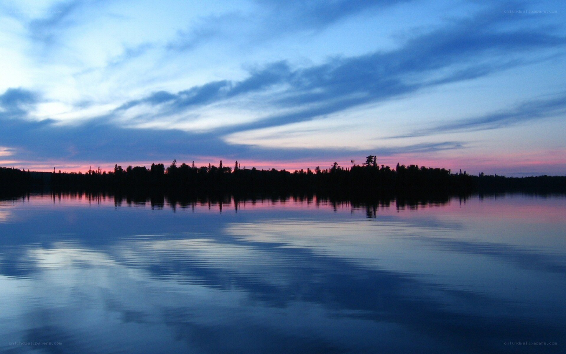 Sunset over a calm lake