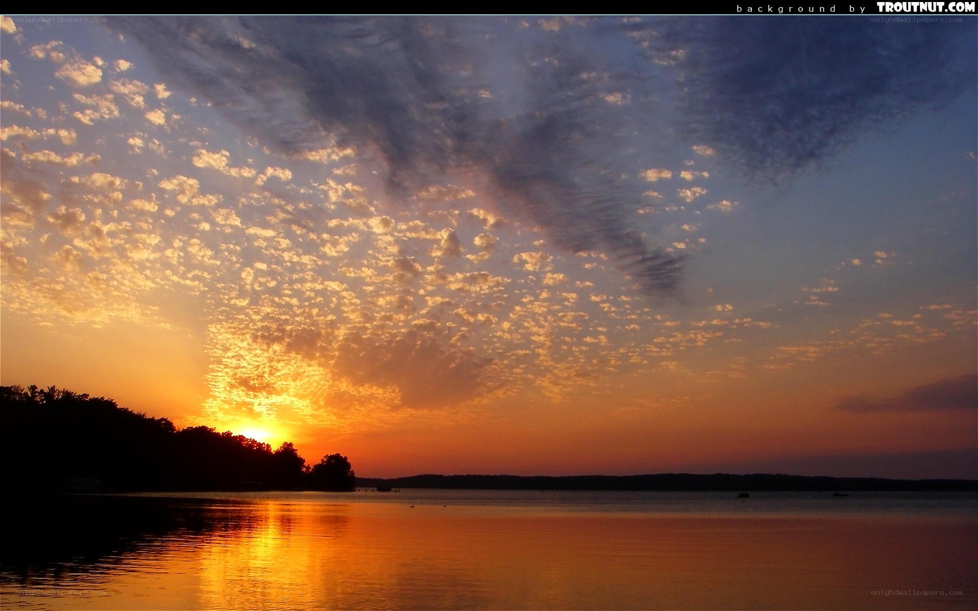 sunset over a calm lake