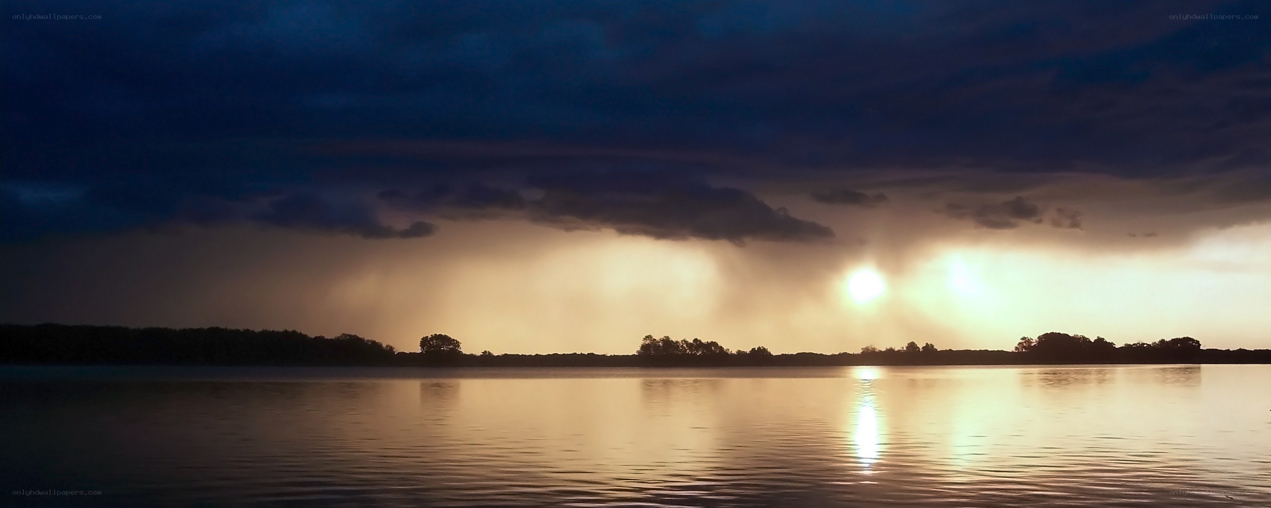 Sunset over a calm lake