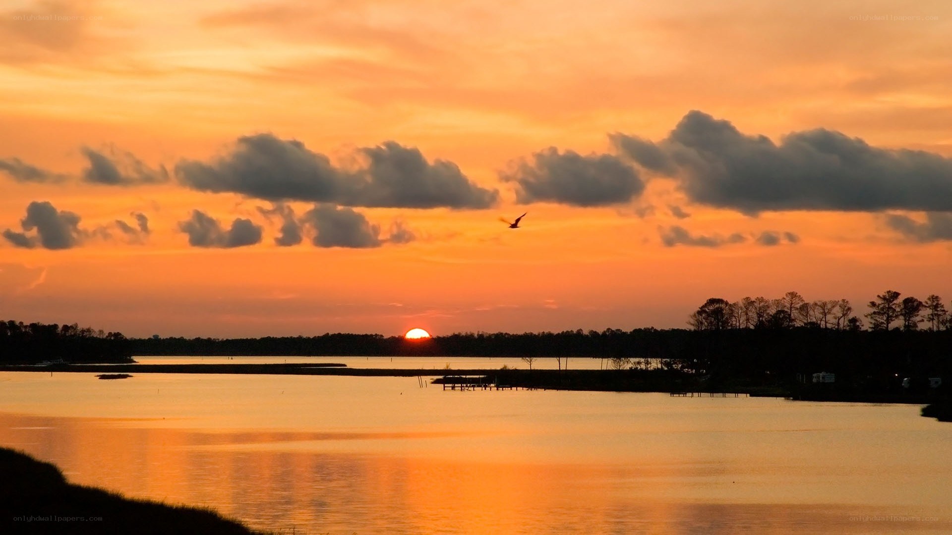 sunset over a calm lake