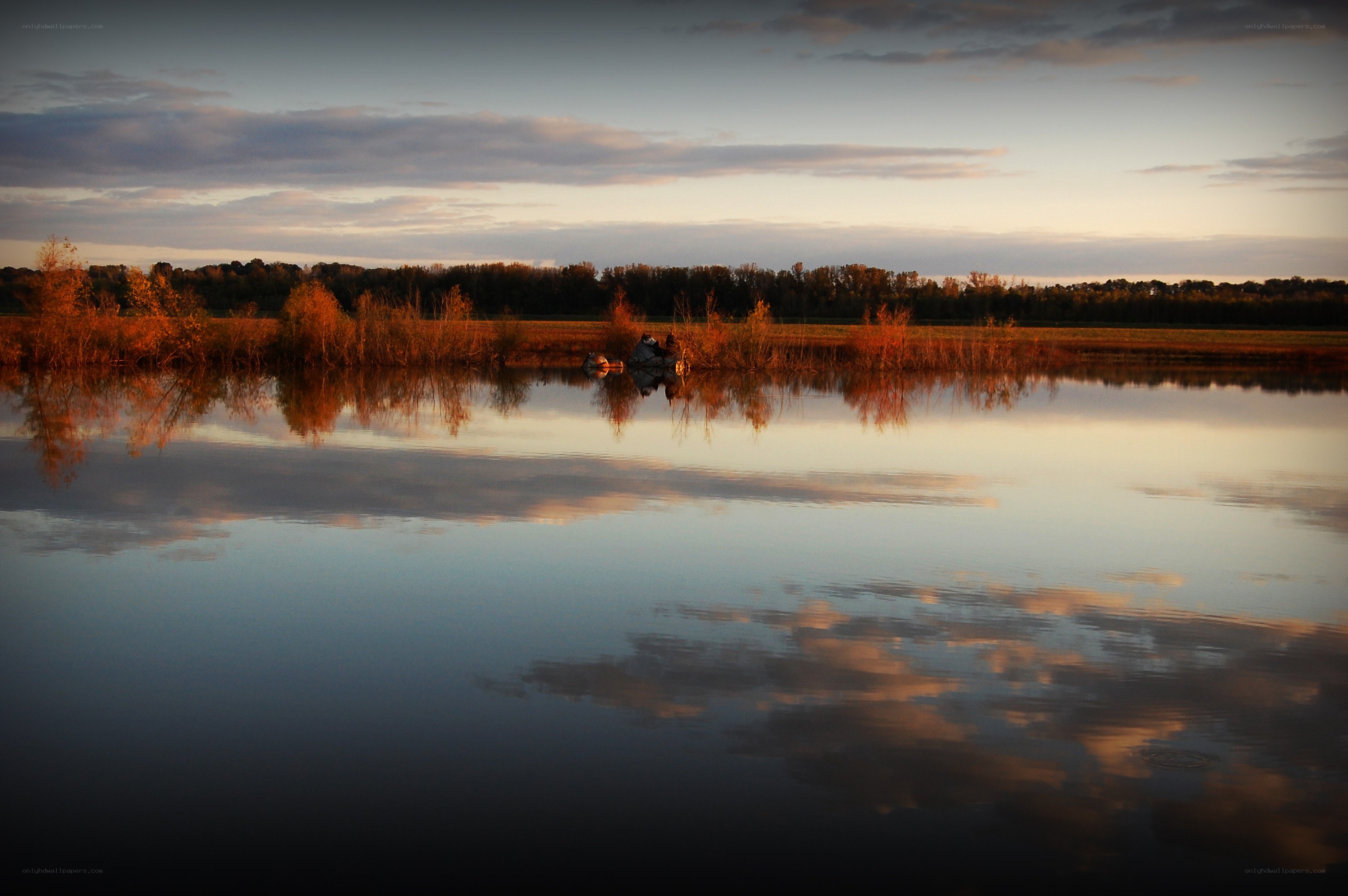 Sunset over a calm lake