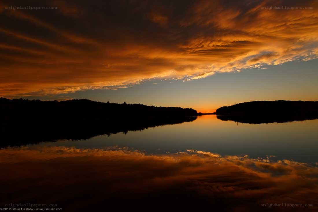 Sunset over a calm lake