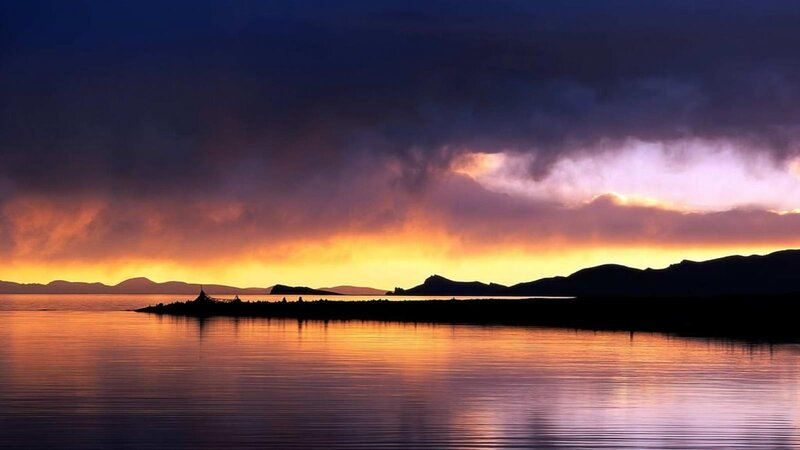 sunset over a calm lake