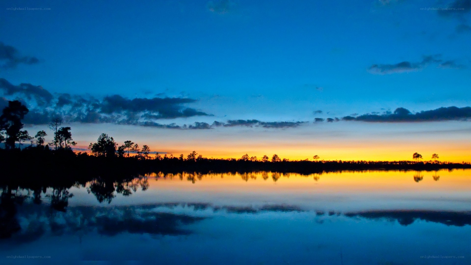 sunset over a calm lake