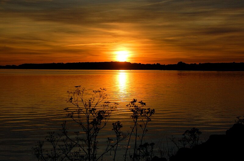 Sunset over a calm lake