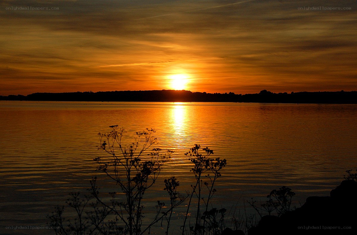 Sunset over a calm lake