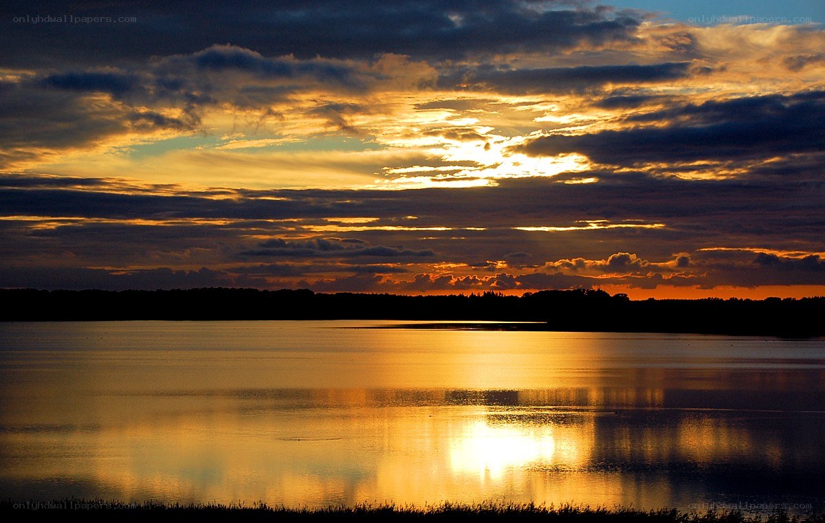 Sunset over a calm lake