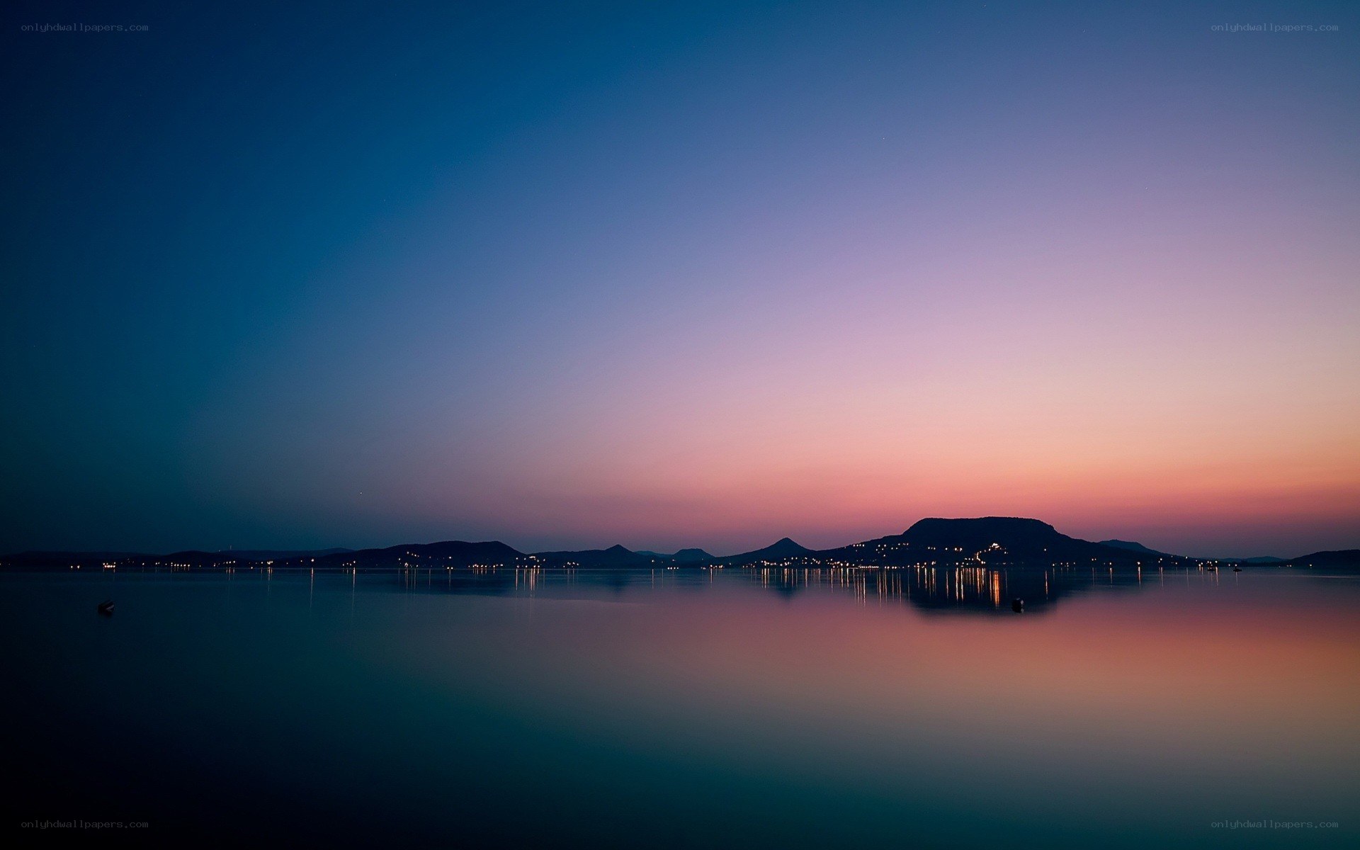sunset over a calm lake