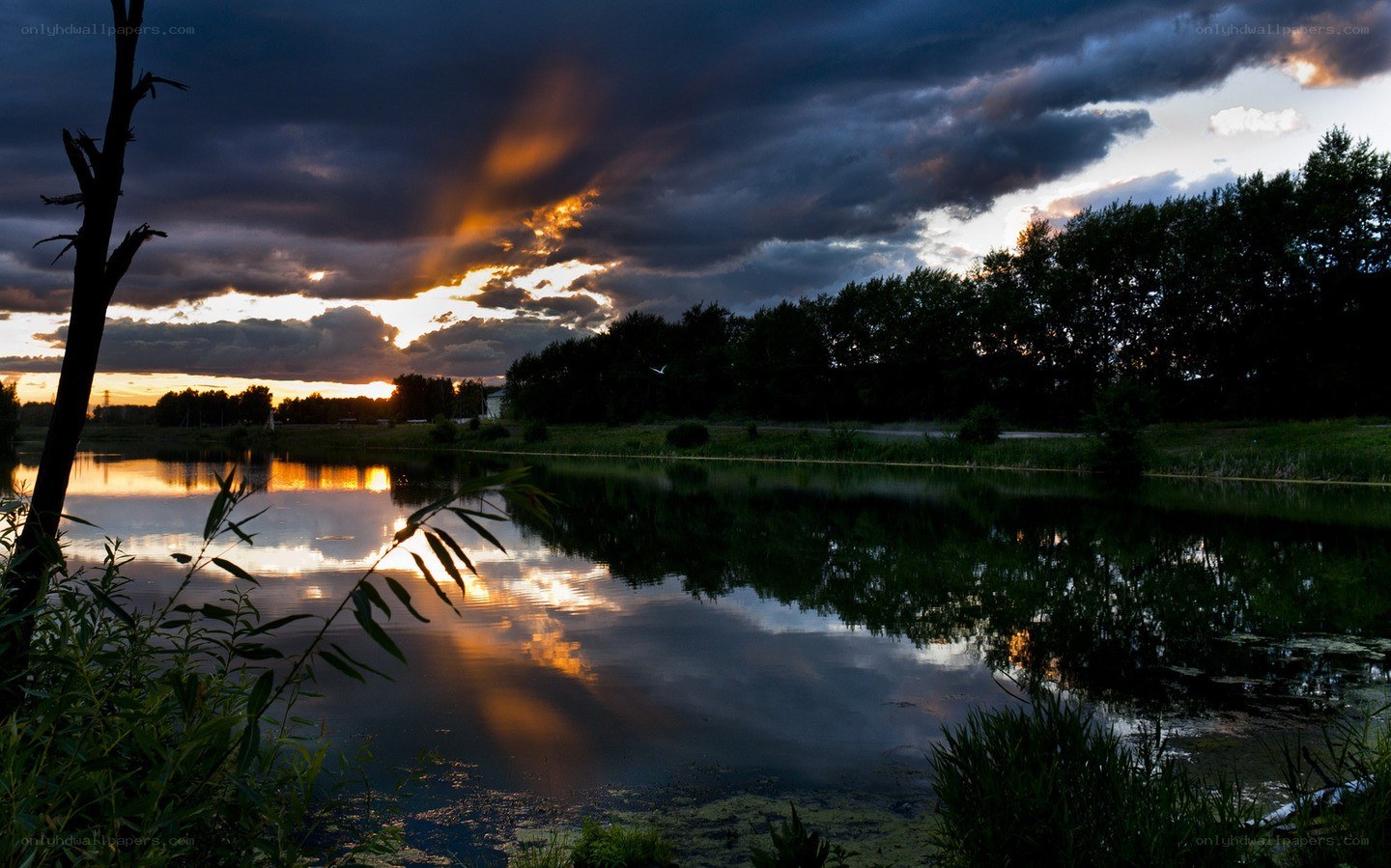 Sunset over a calm lake