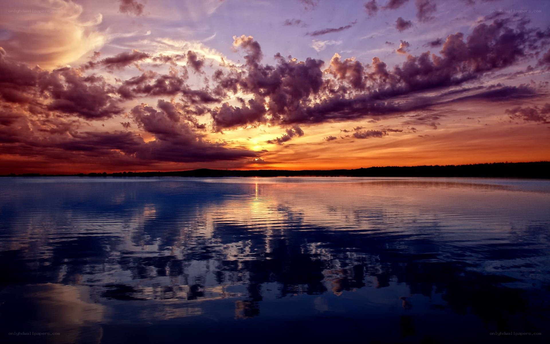 sunset over a calm lake