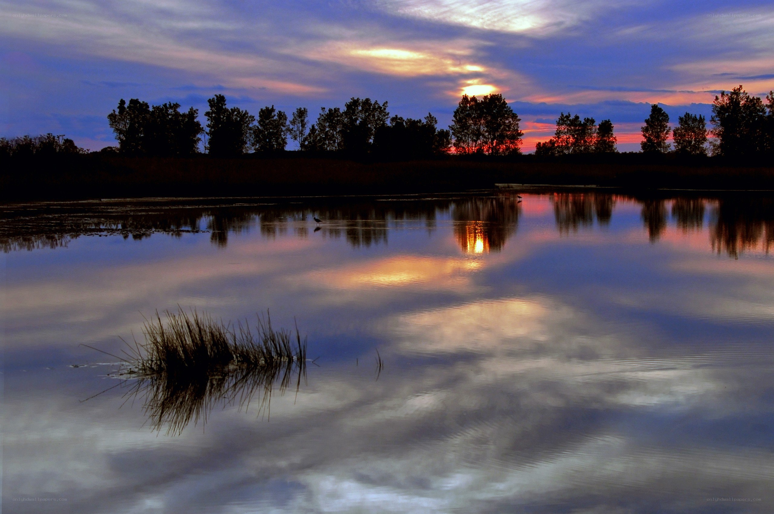 Sunset over a calm lake