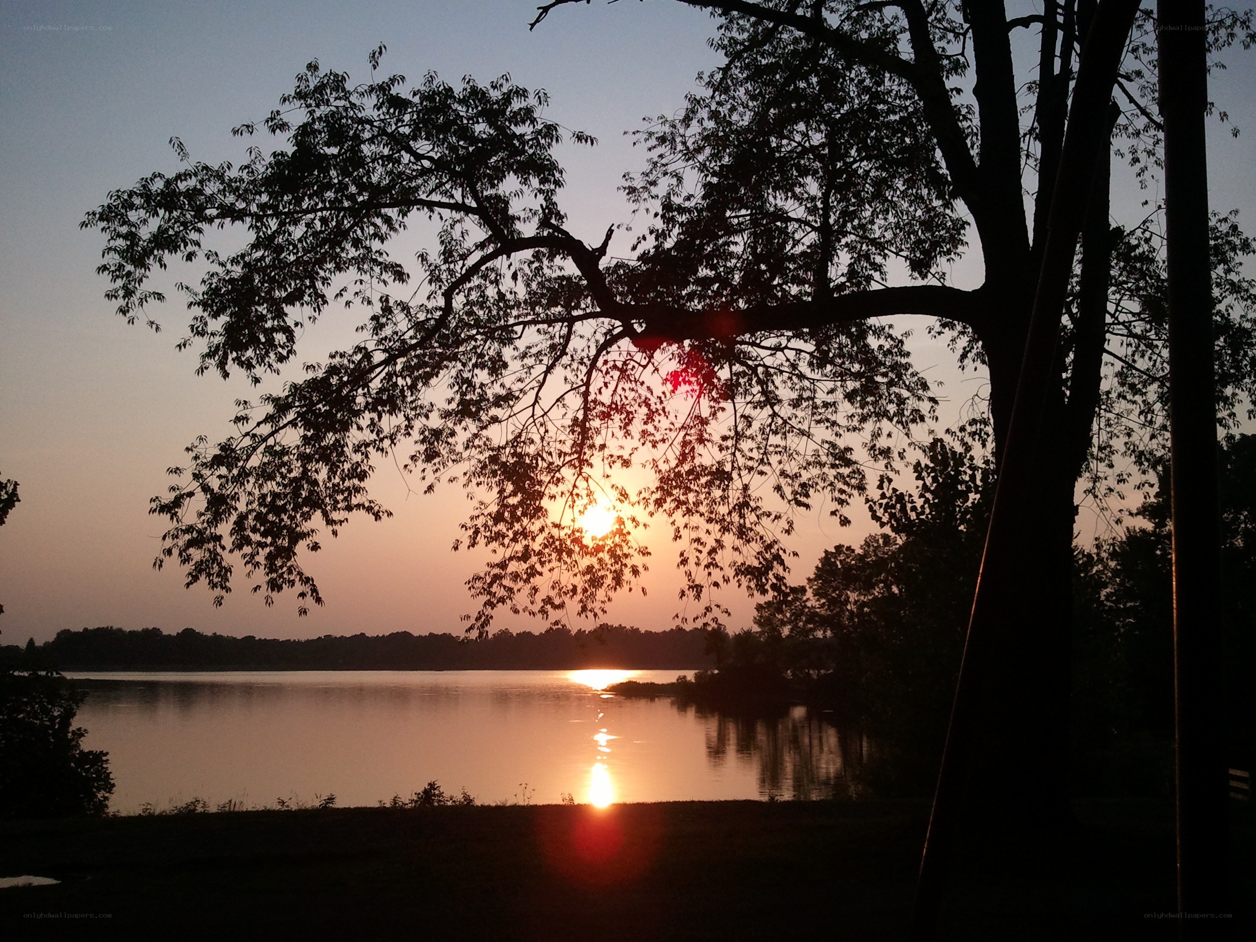 Sunset over a calm lake