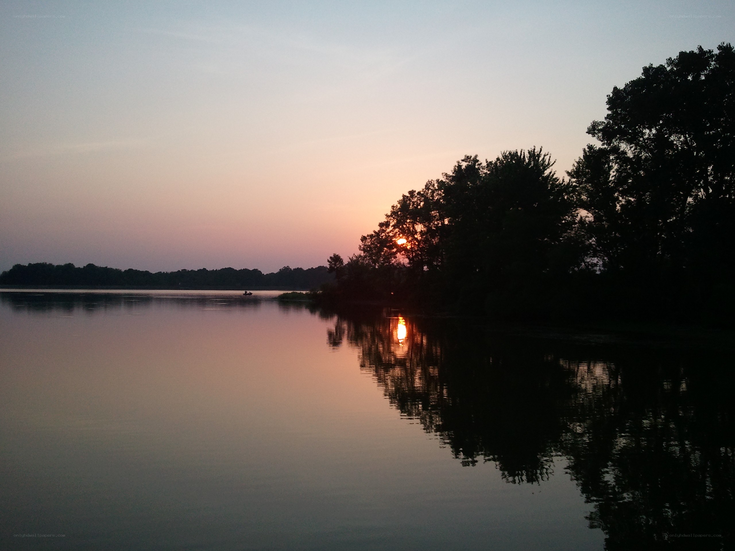 Sunset over a calm lake