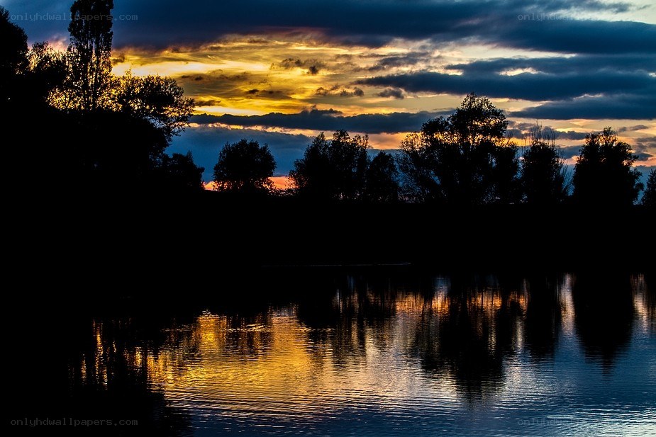 Sunset over a calm lake