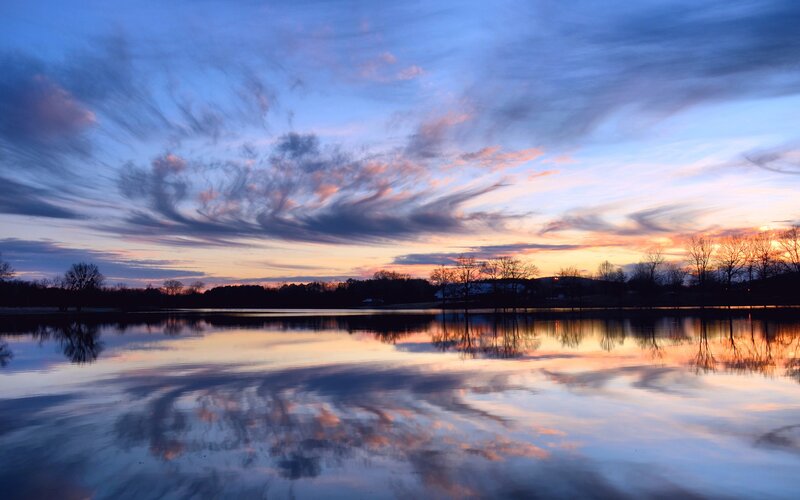 Sunset over a calm lake