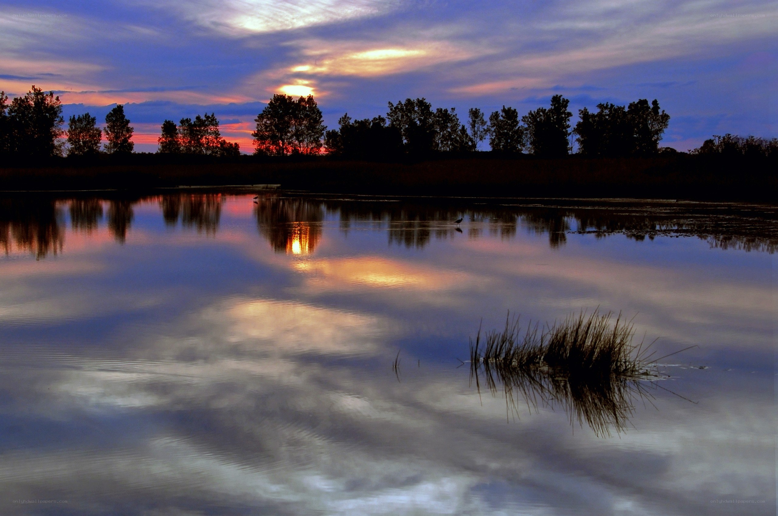 Sunset over a calm lake