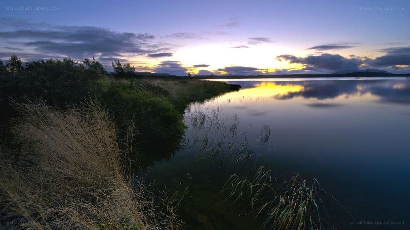 sunset over a calm lake