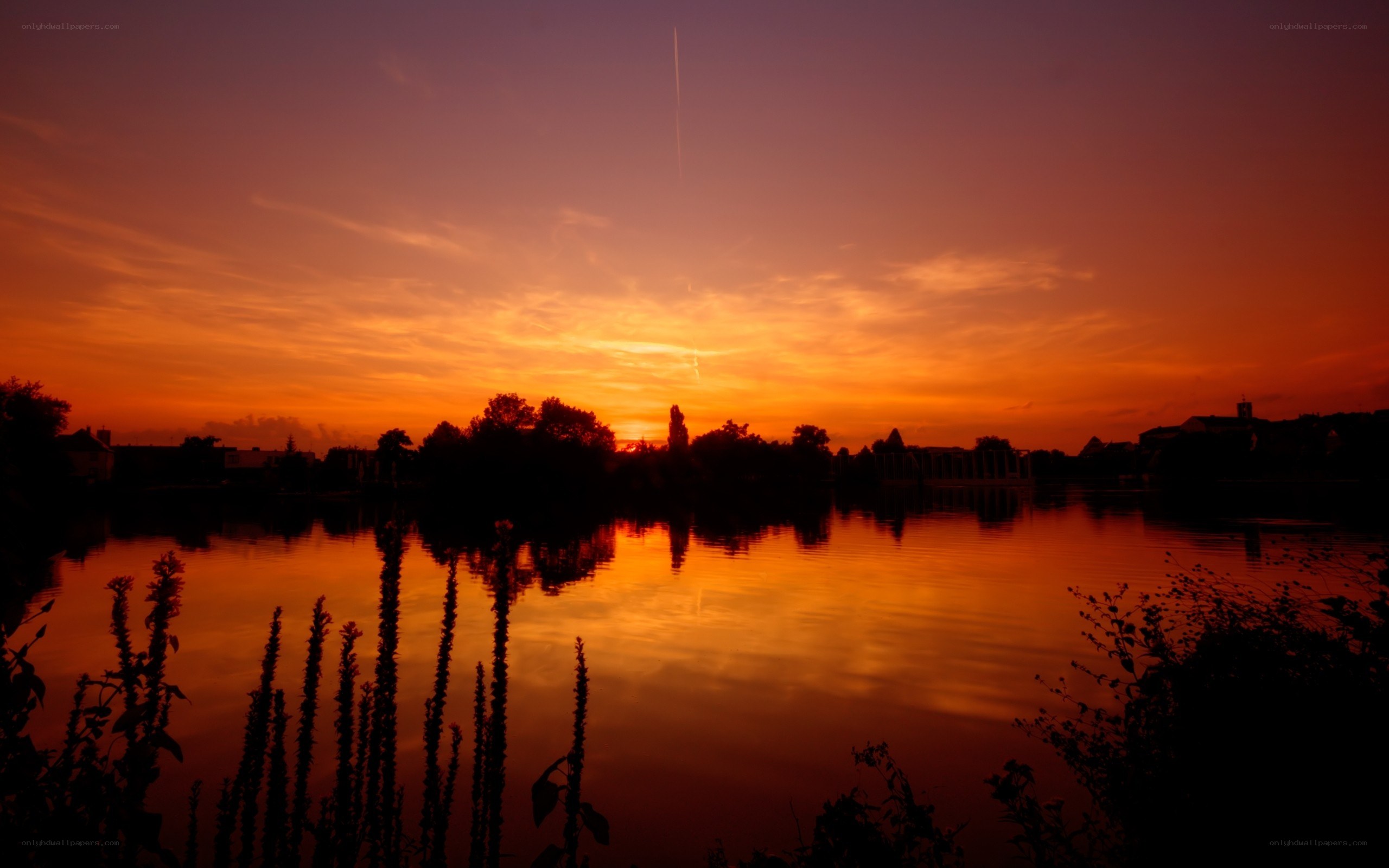 Sunset over a calm lake