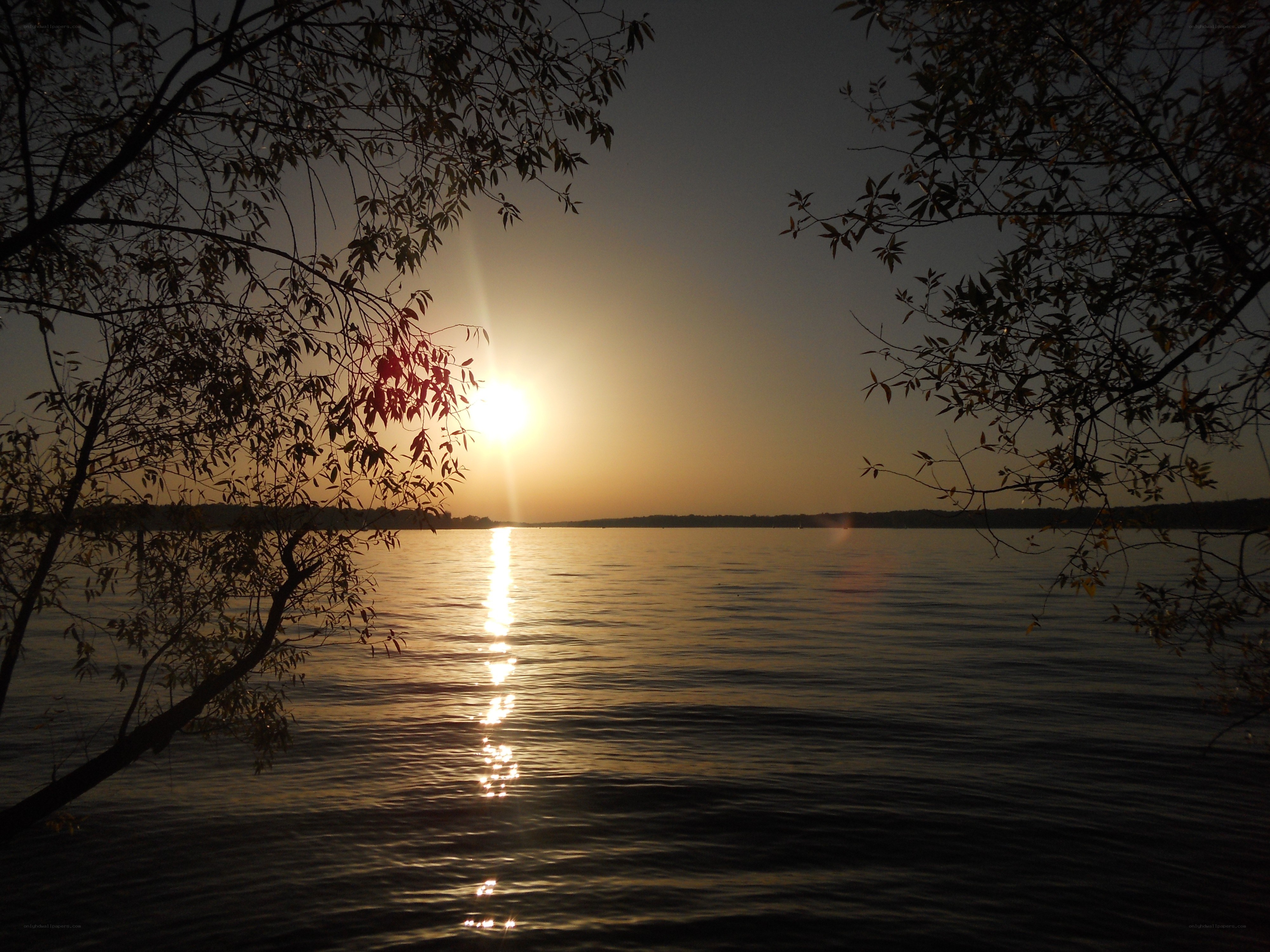 sunset over a calm lake