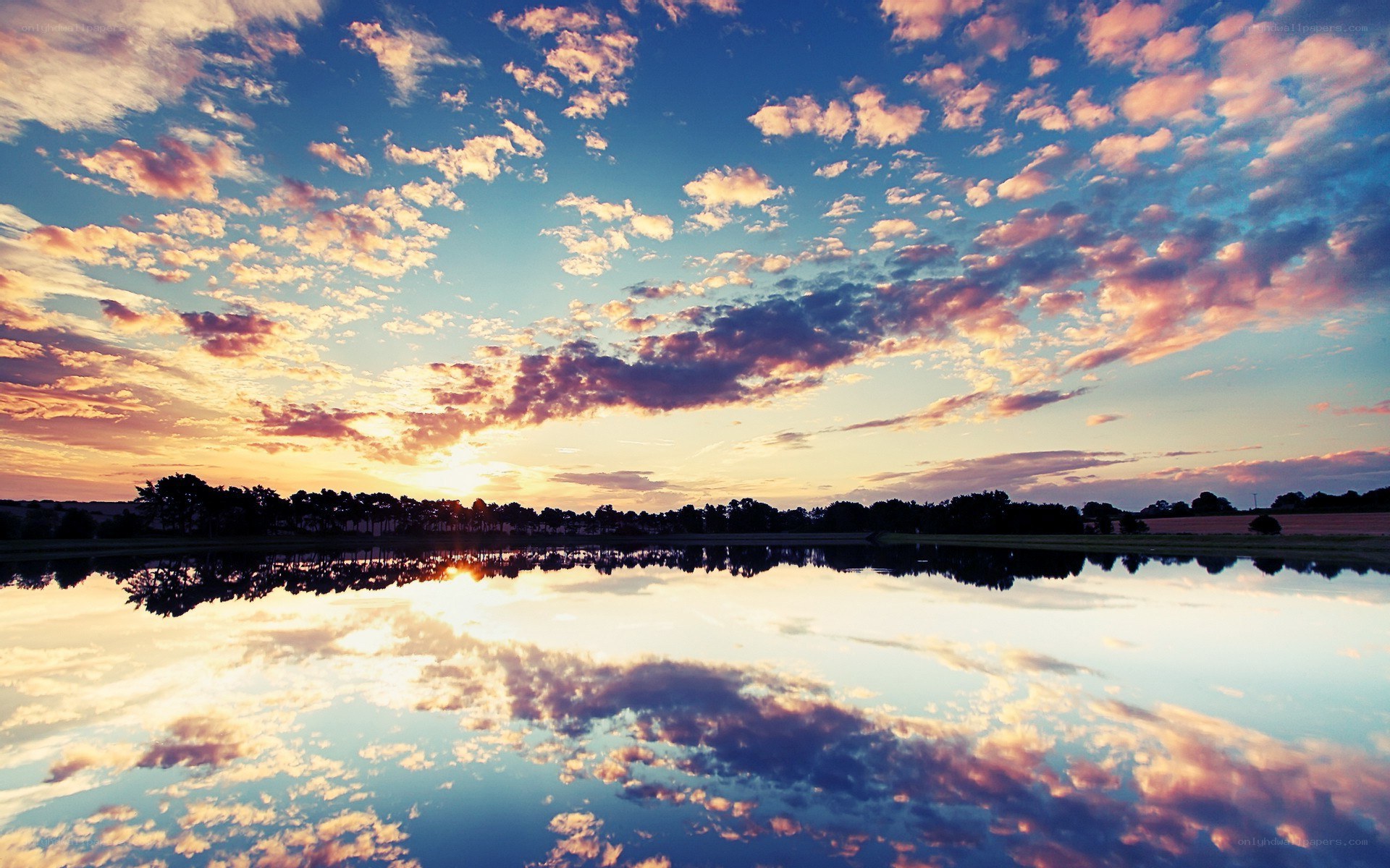 sunset over a calm lake