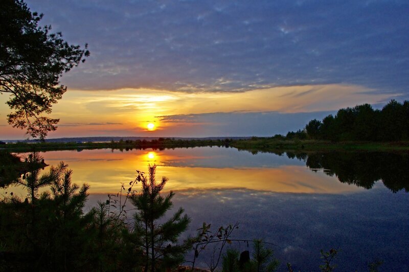 sunset over a calm lake