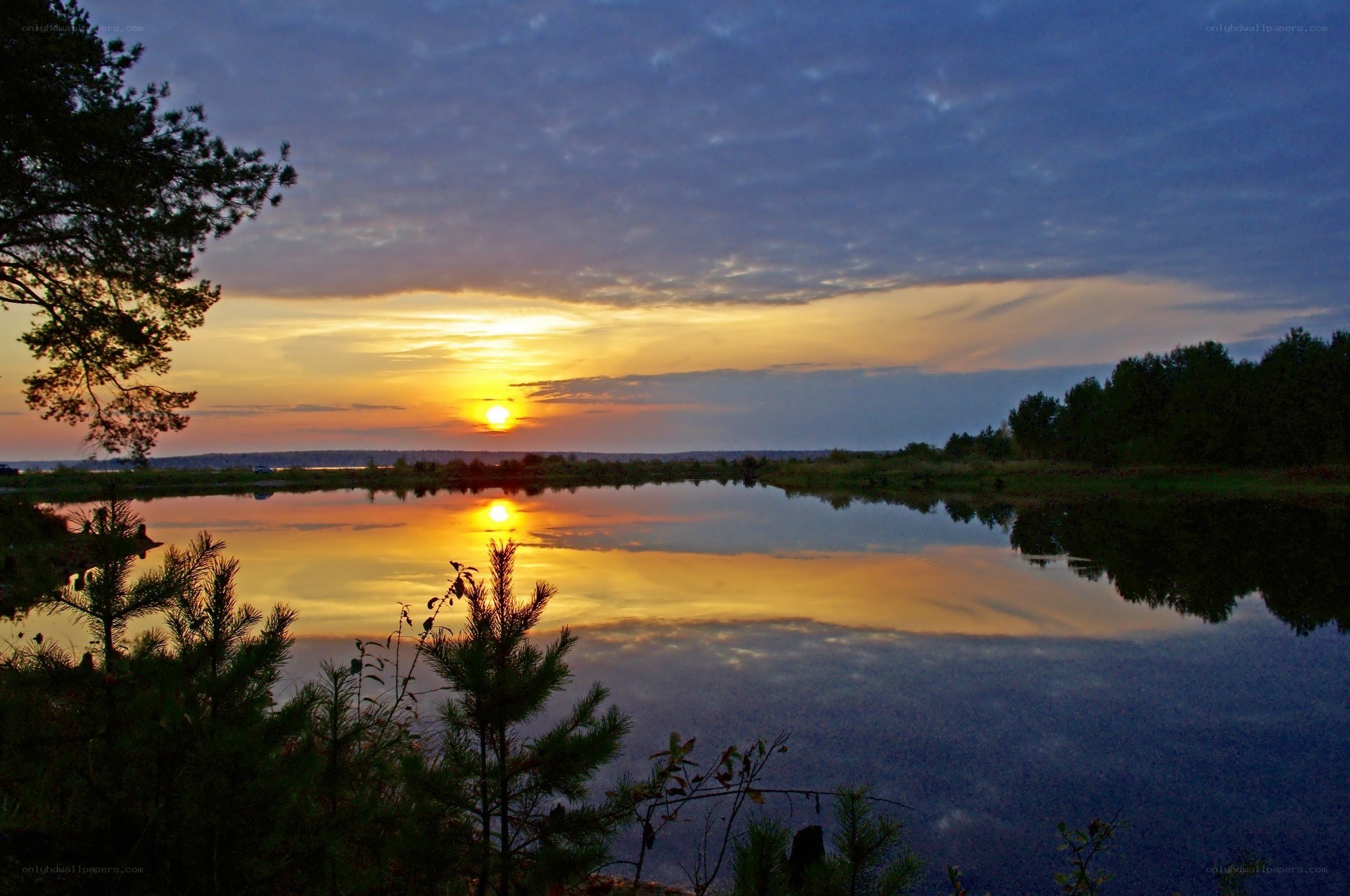 sunset over a calm lake