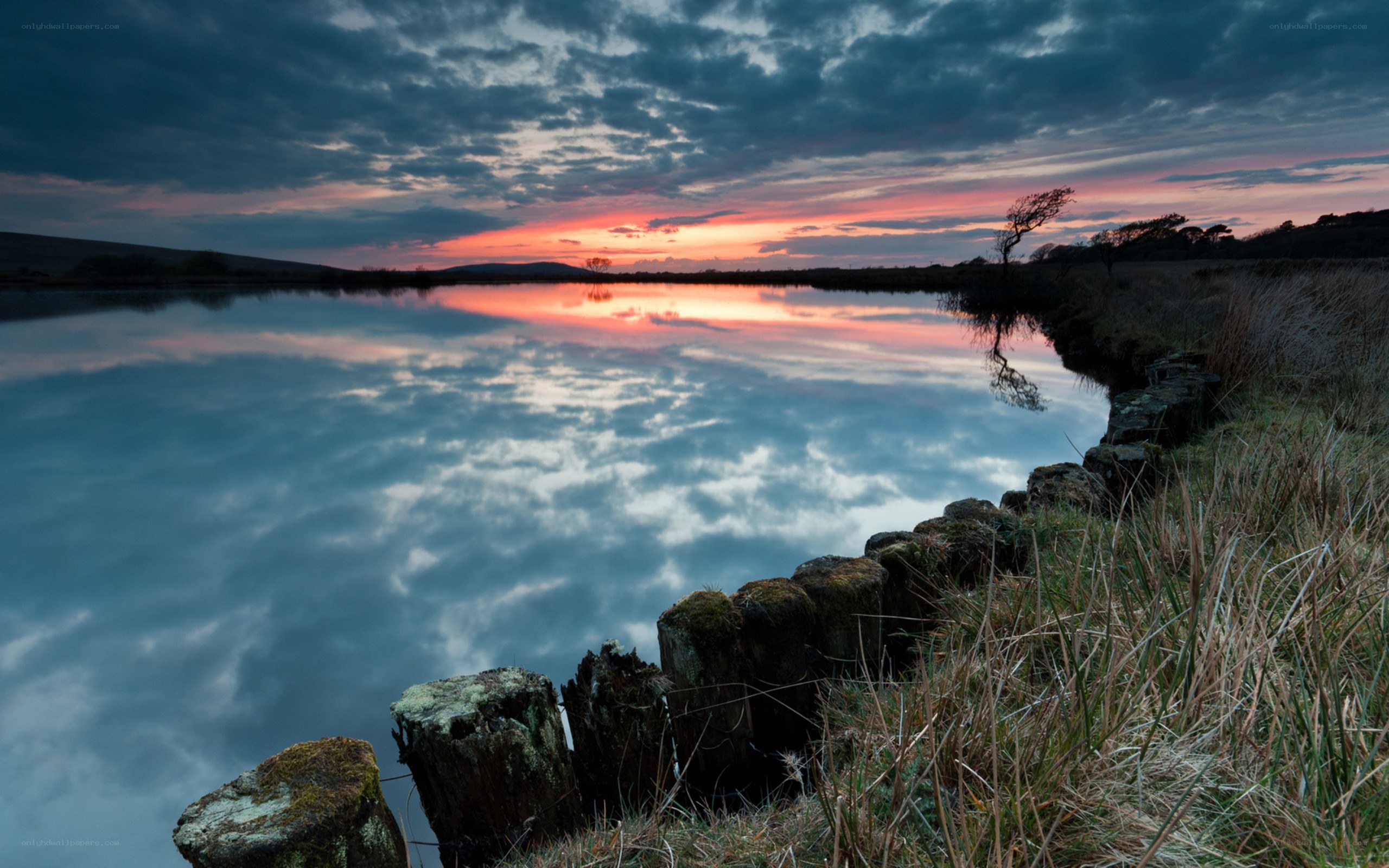 sunset over a calm lake