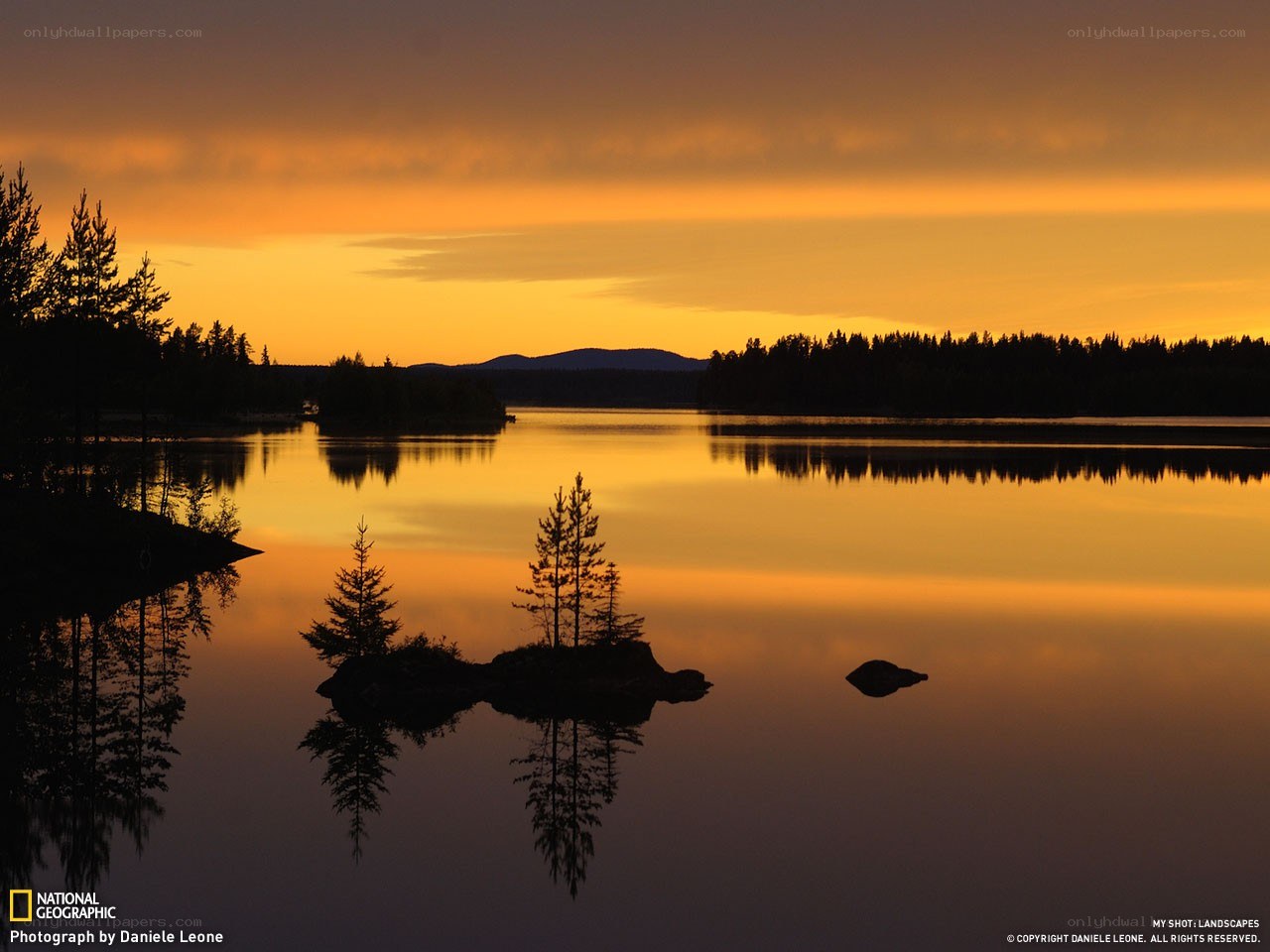 Sunset over a calm lake