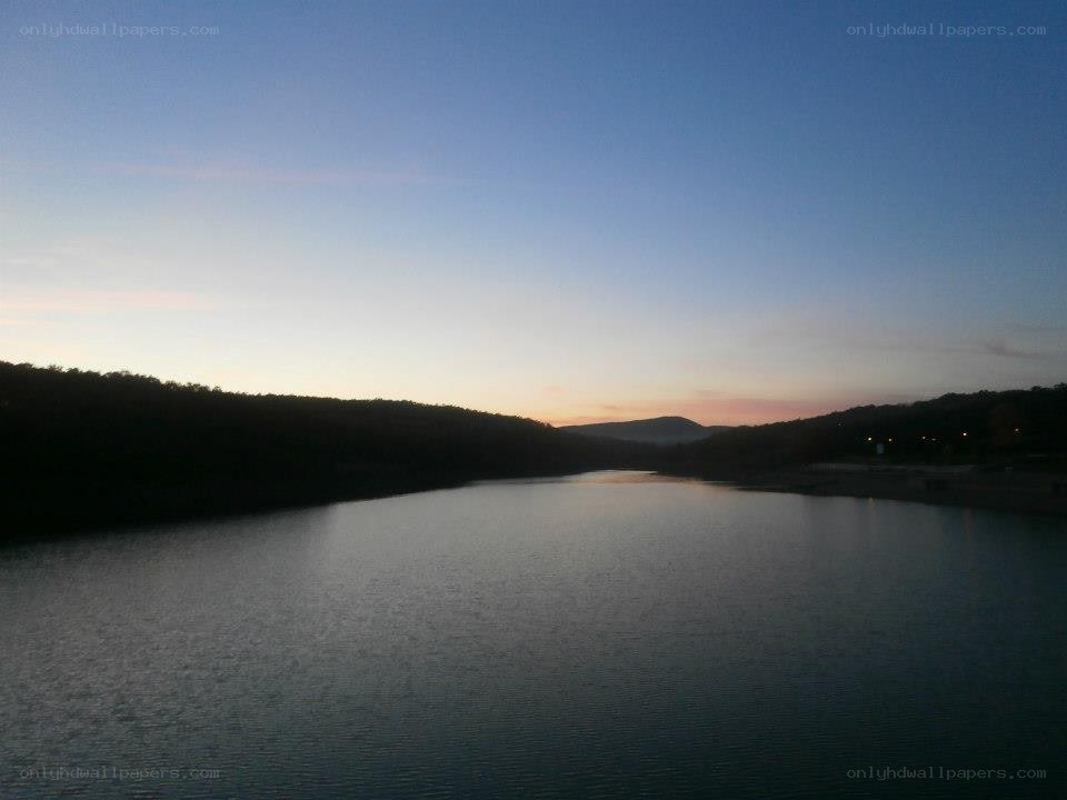 sunset over a calm lake