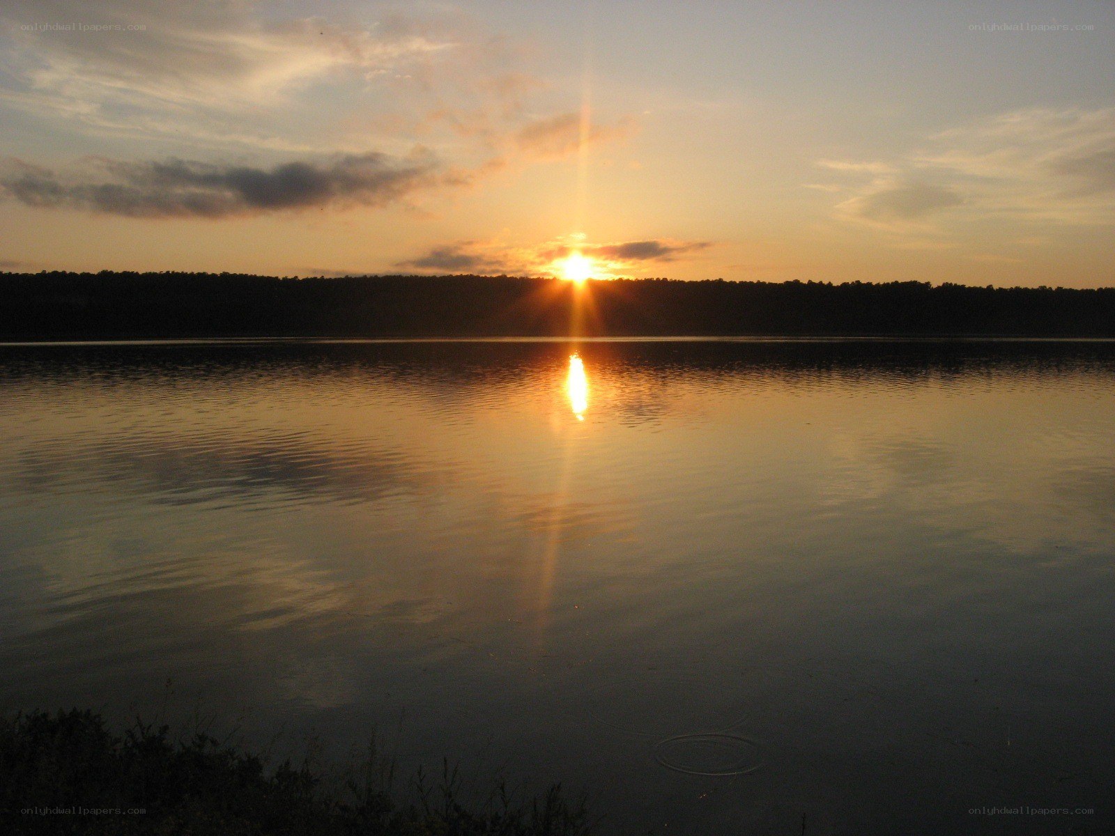 Sunset over a calm lake