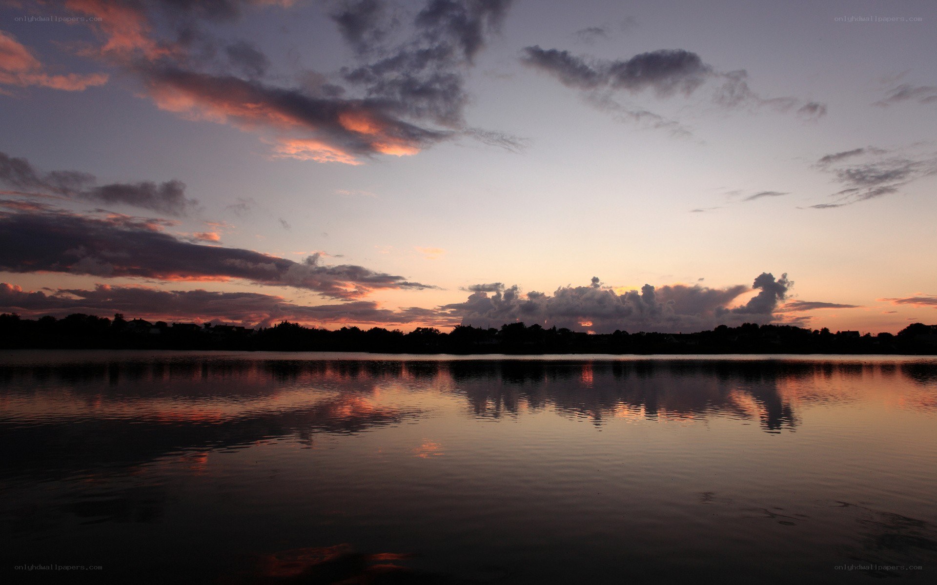 sunset over a calm lake
