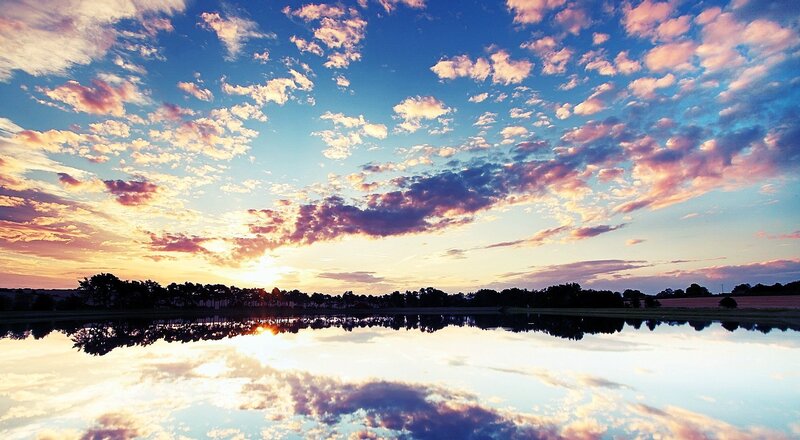 sunset over a calm lake