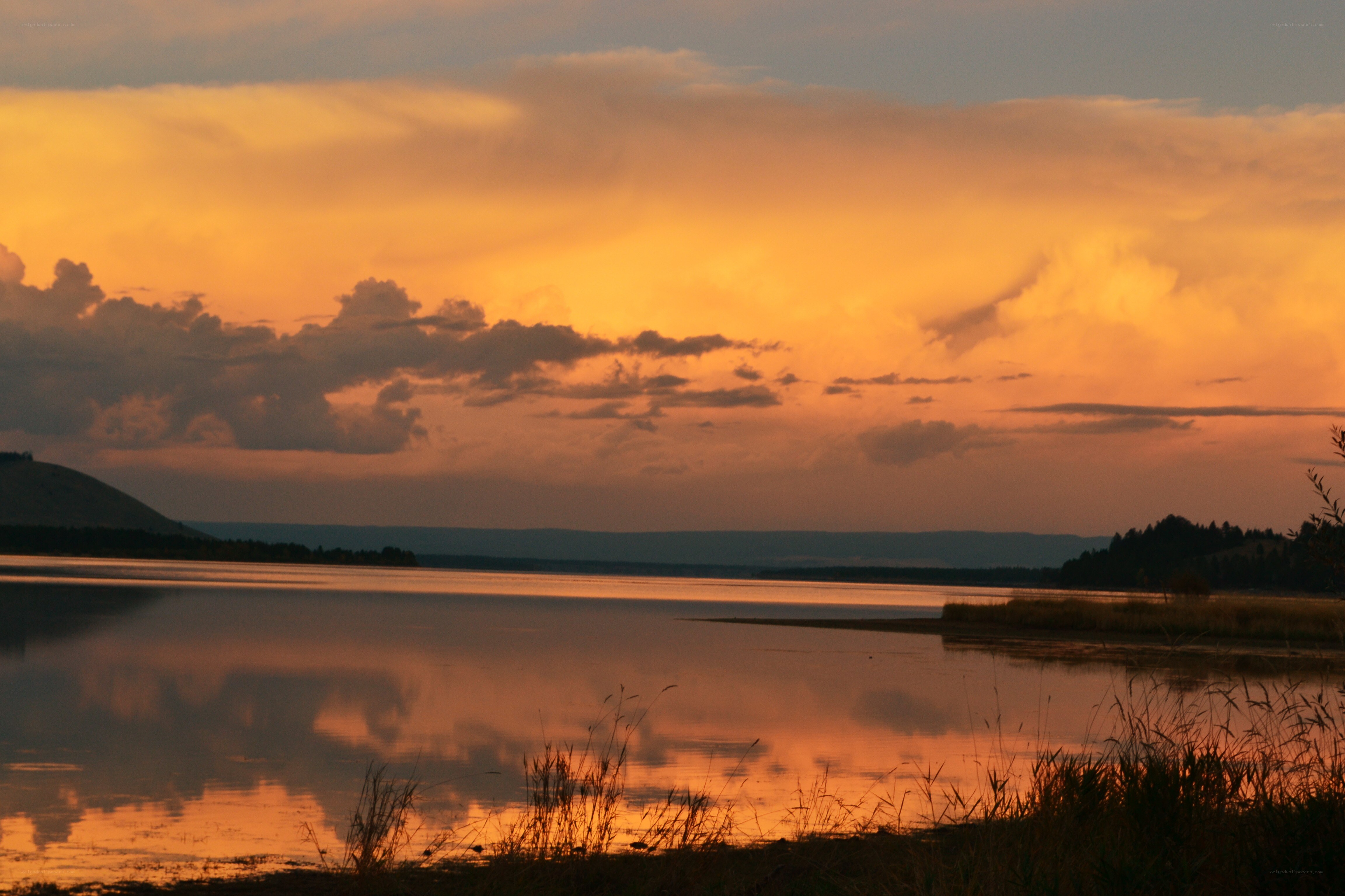 sunset over a calm lake