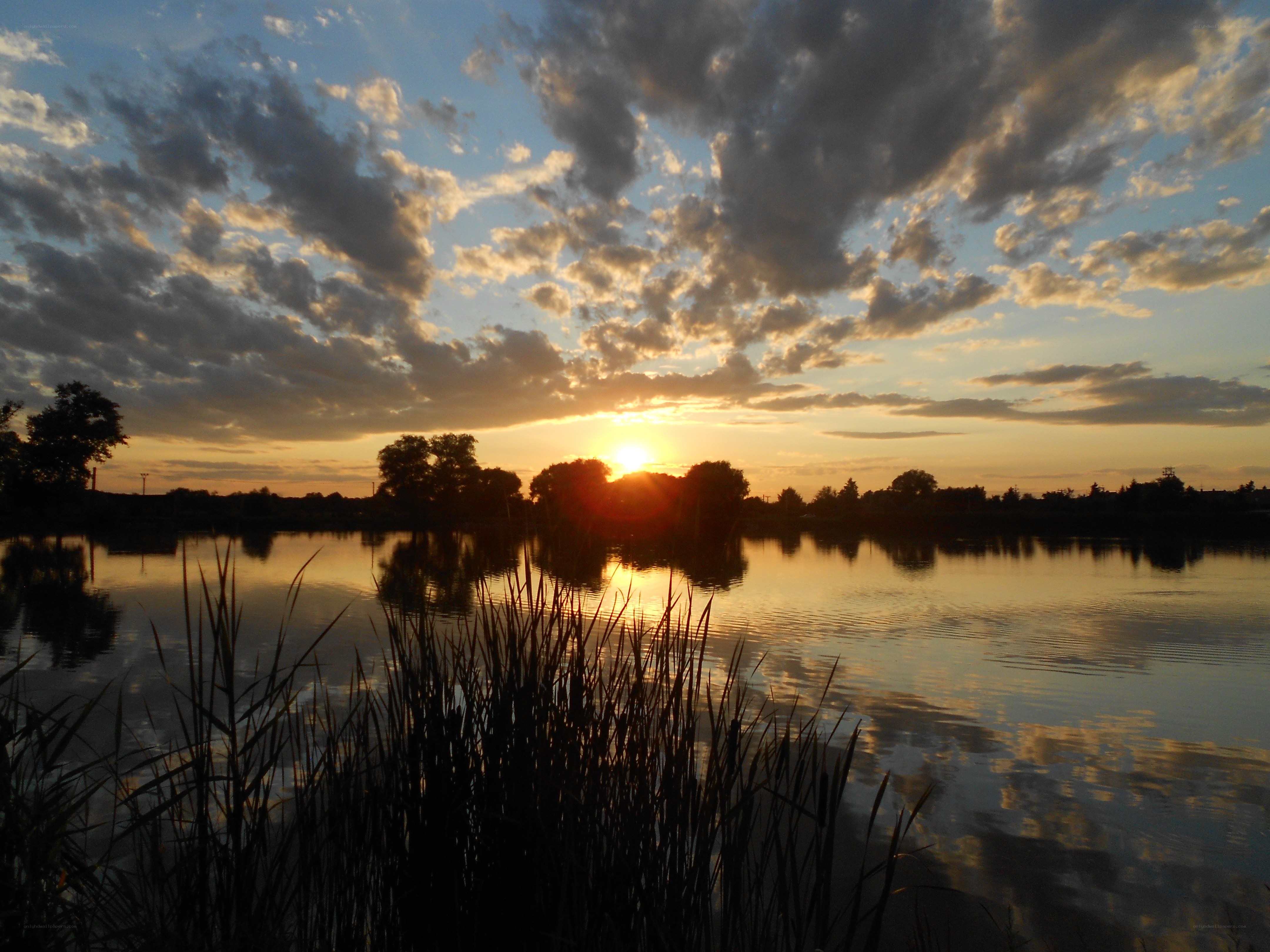 Sunset over a calm lake