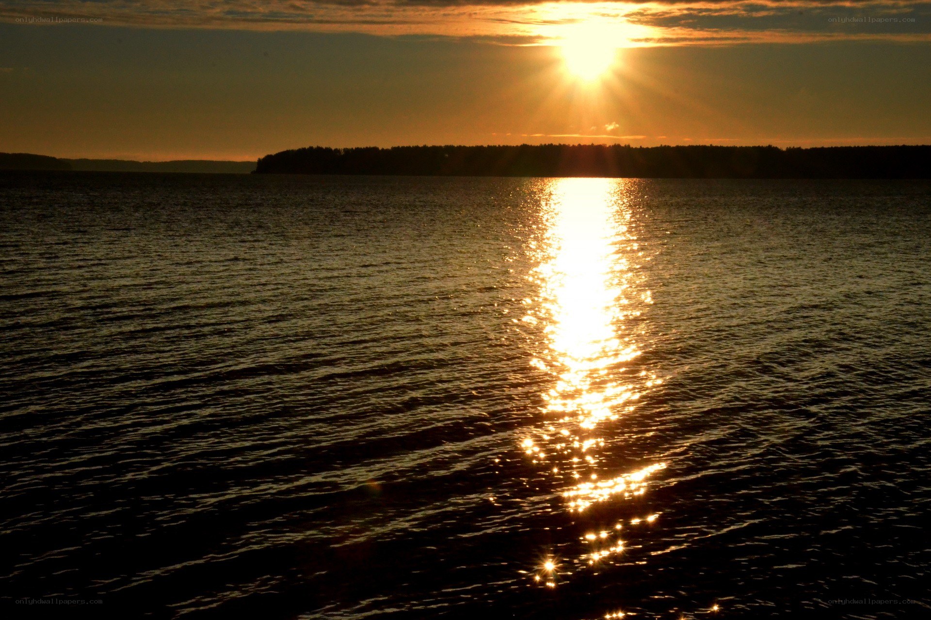 Sunset over a calm lake