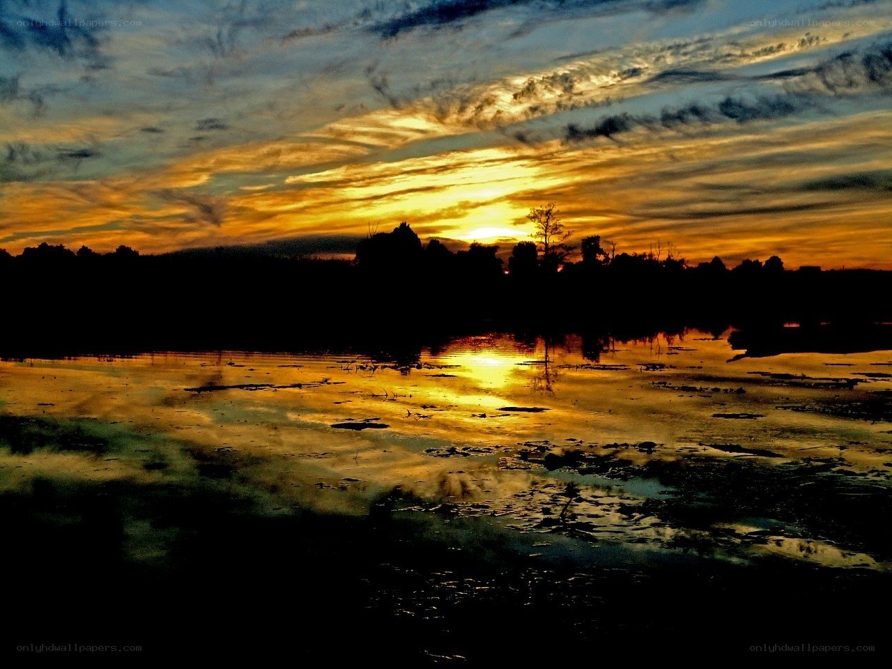 Sunset over a calm lake