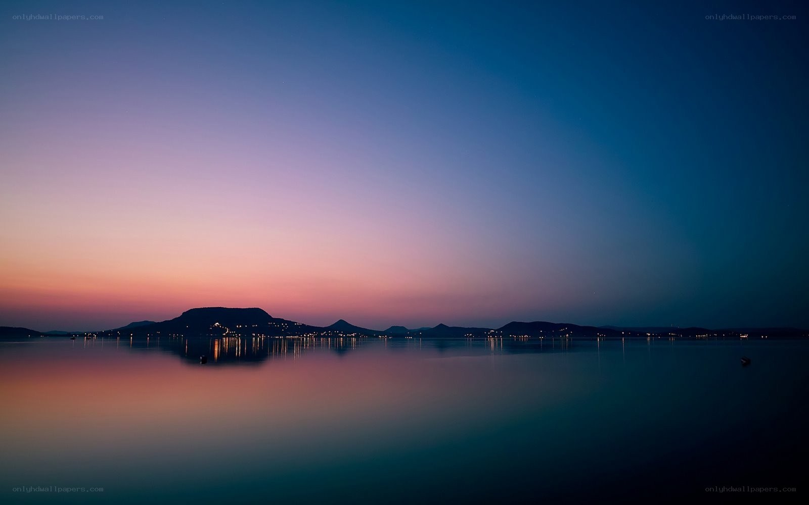 sunset over a calm lake