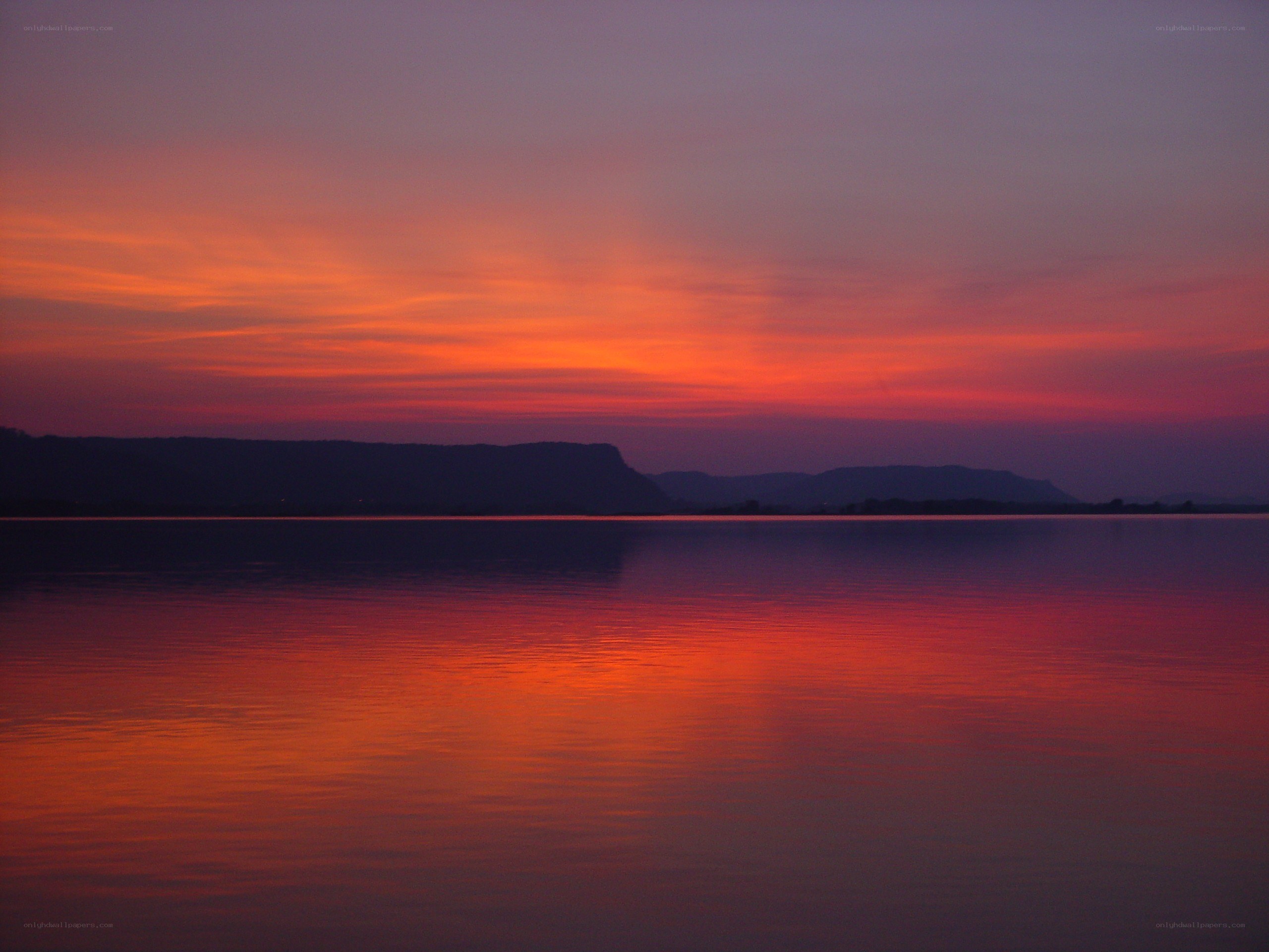 Sunset over a calm lake