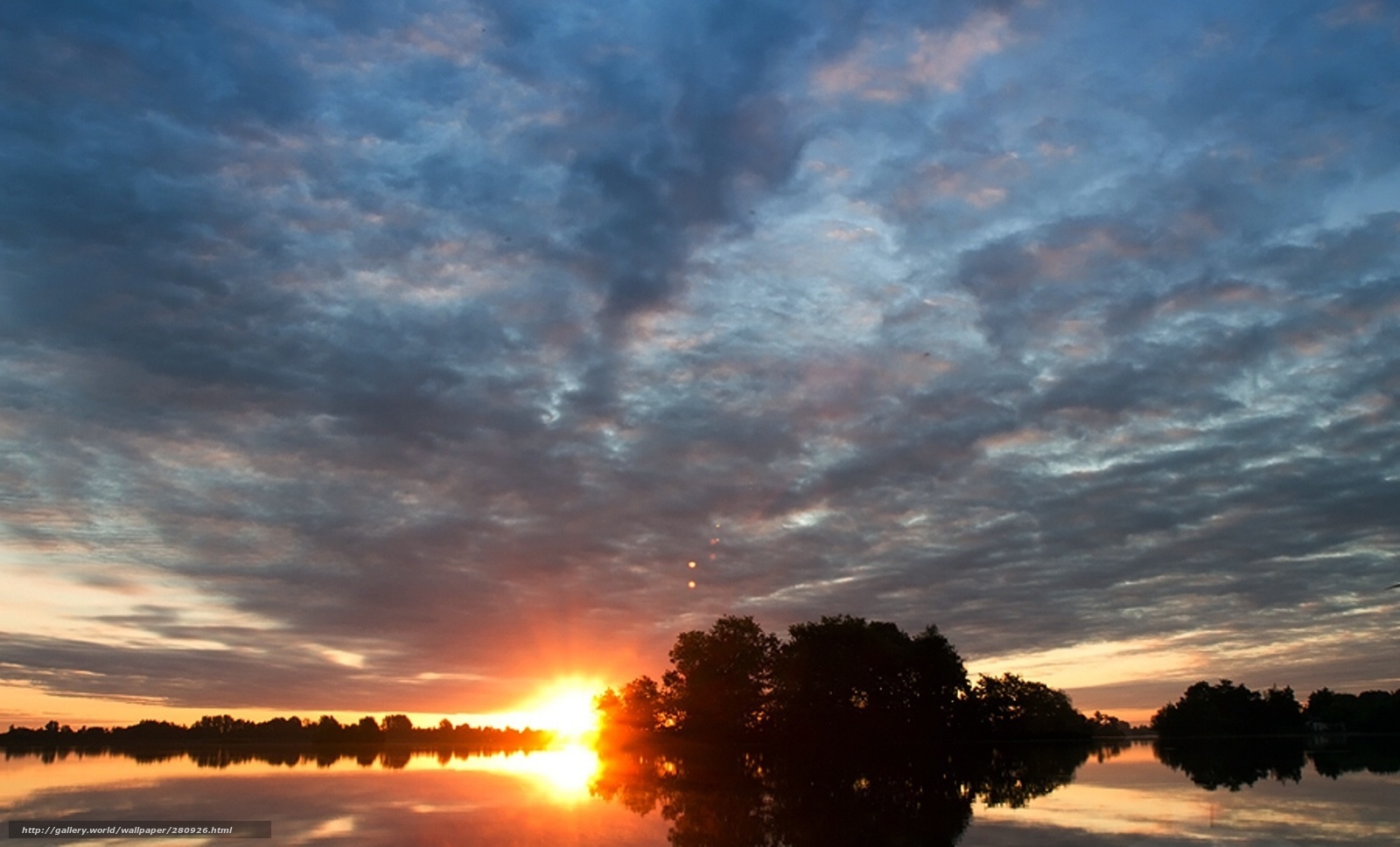 Sunset over a calm lake