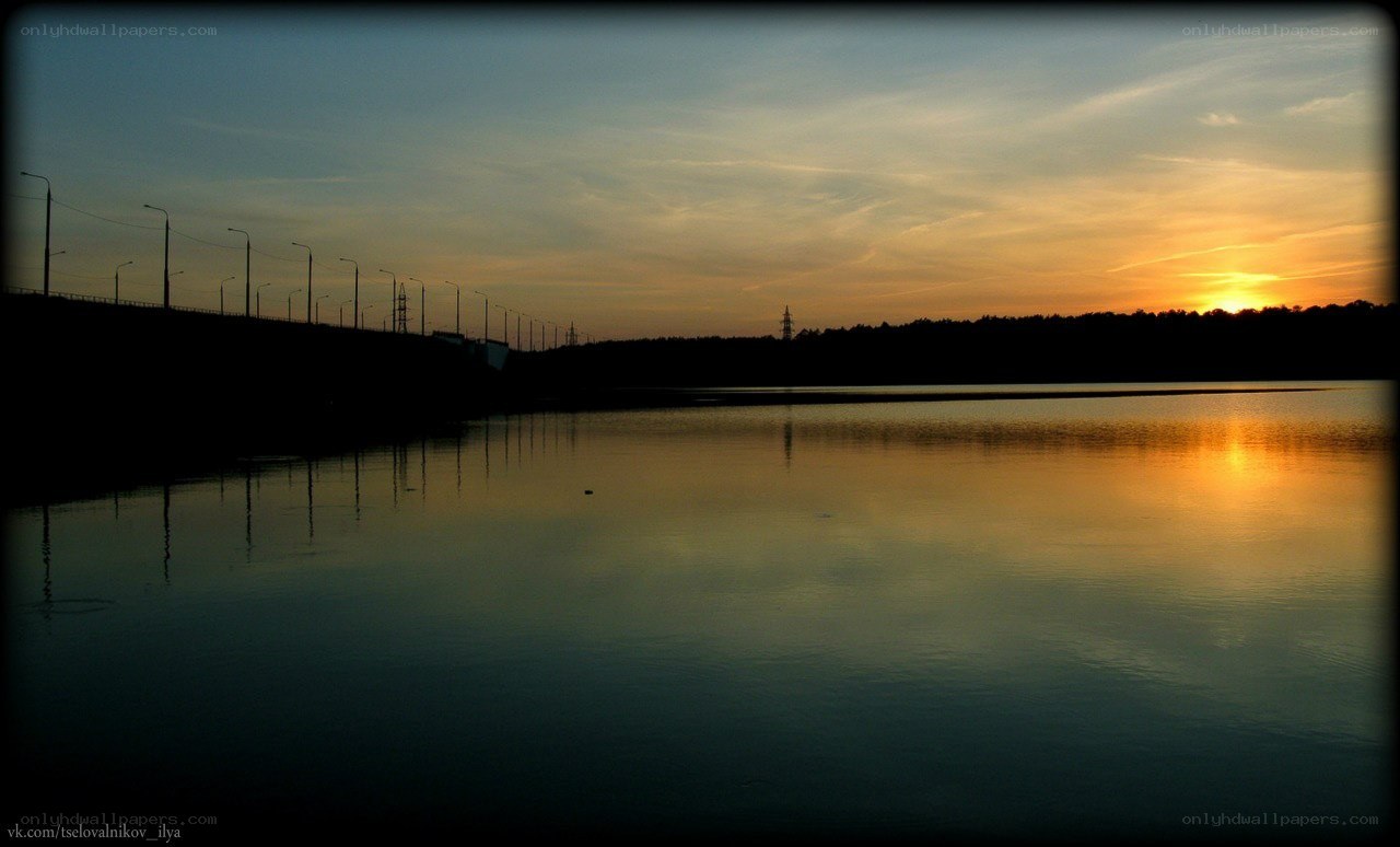 sunset over a calm lake