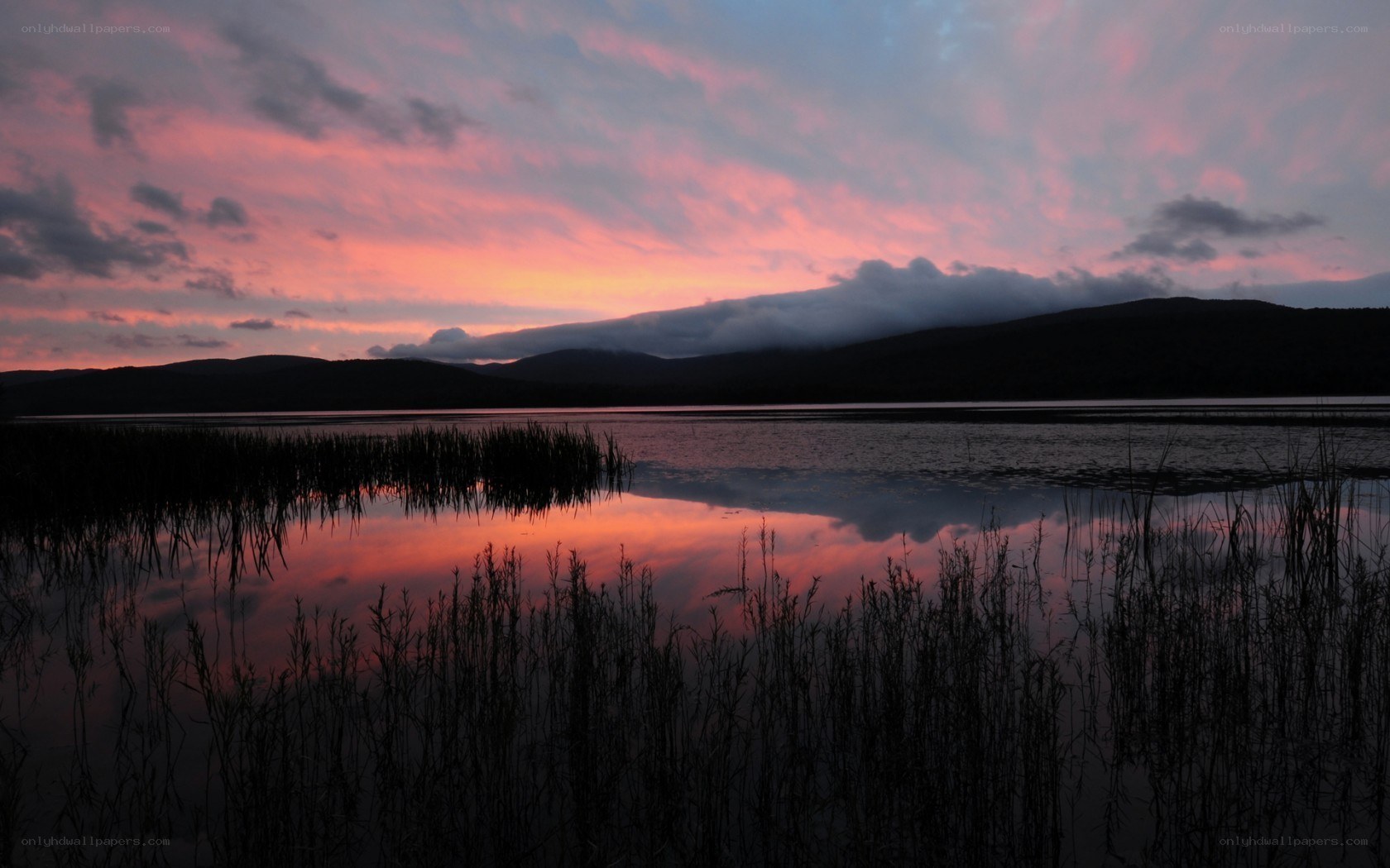 sunset over a calm lake