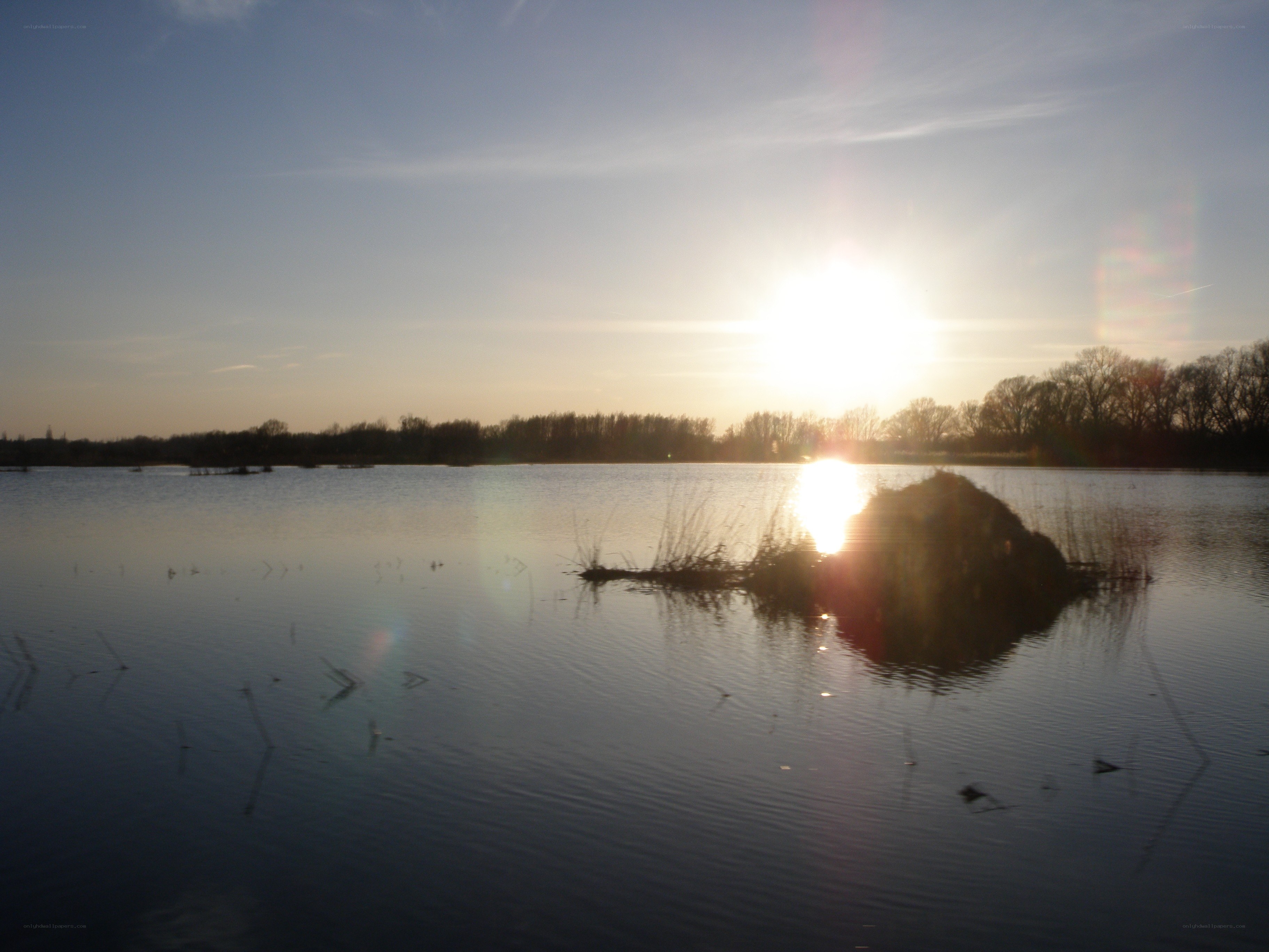 Sunset over a calm lake